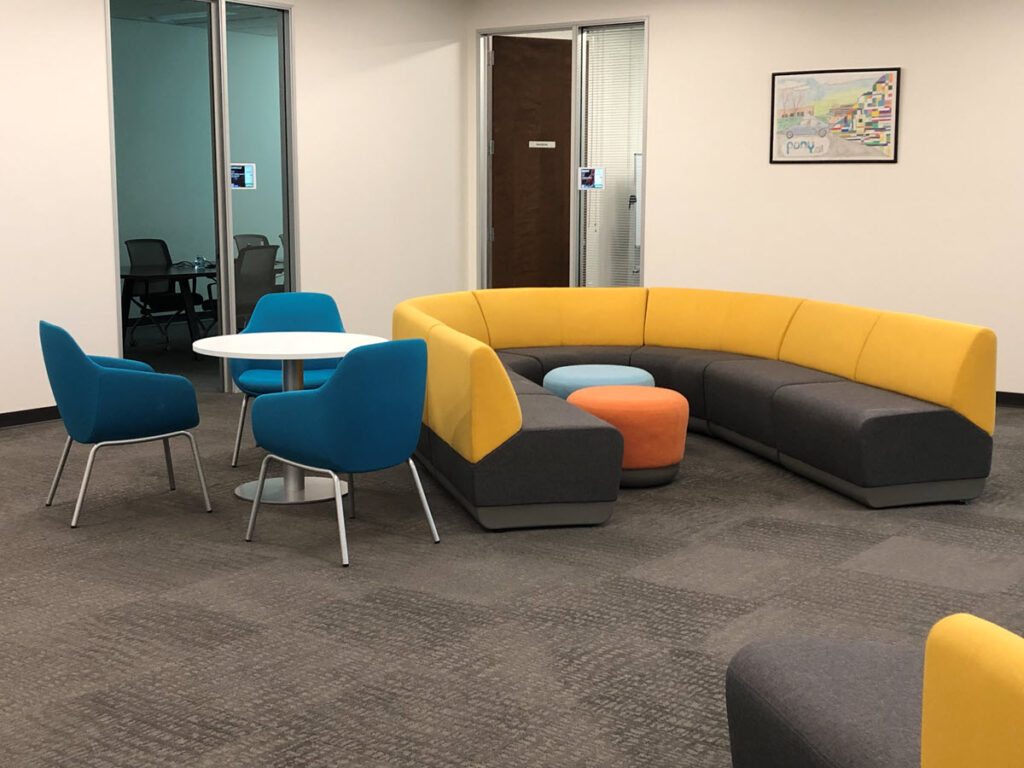 Modern Office Guest Seating and Informal Meeting Area
Commercial office guest seating area furnished by Indoff Commercial Interiors. This informal meeting space features upholstered lounge chairs and a small table designed to support visitor reception, employee discussions, and collaborative conversations in a modern workplace.